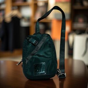 Steve Madden Black Belt Bag with Adjustable Strap and Compact Design